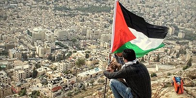 الجيش الاسرائيلي يوضح حادثة إنزال علم فلسطين في نابلس